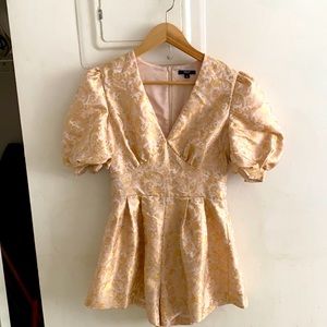 Elegant jumpsuit with gold finiture
